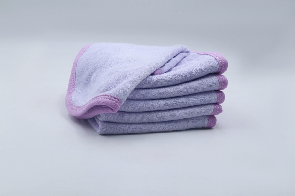 stack of washcloths to use as warm compress